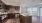 a kitchen with wooden cabinets