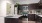 a kitchen with black cabinets