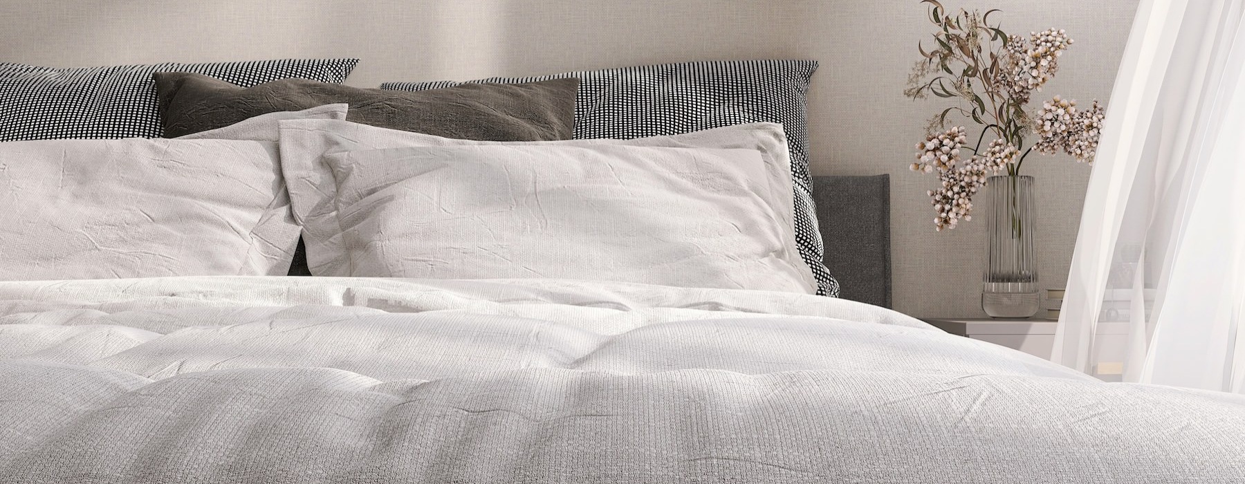 a bed with a white sheet