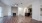 a large living room with a wood floor