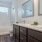 a bathroom with a tub sink and toilet