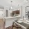 a room with a dining table and stainless steal appliances