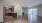 a large kitchen with wooden floors
