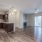a large kitchen with wooden floors